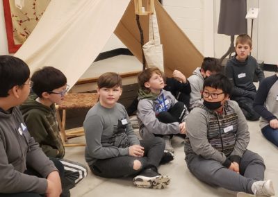 Students gather in a makeshift camp during the Civil War program at the Sheboygan History Museum