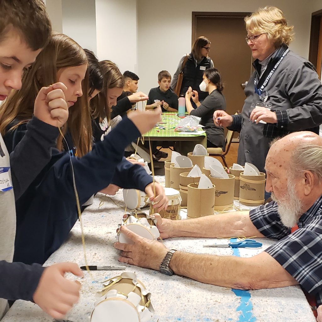 Students and volunteers Hands-on activity making drums in the Historical Museum's Civil War Full-Day Education Program
