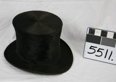 Black felt top hat with identification tag